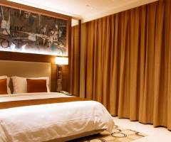 Casino Oceanus Macau: Camera Deluxe con letto king